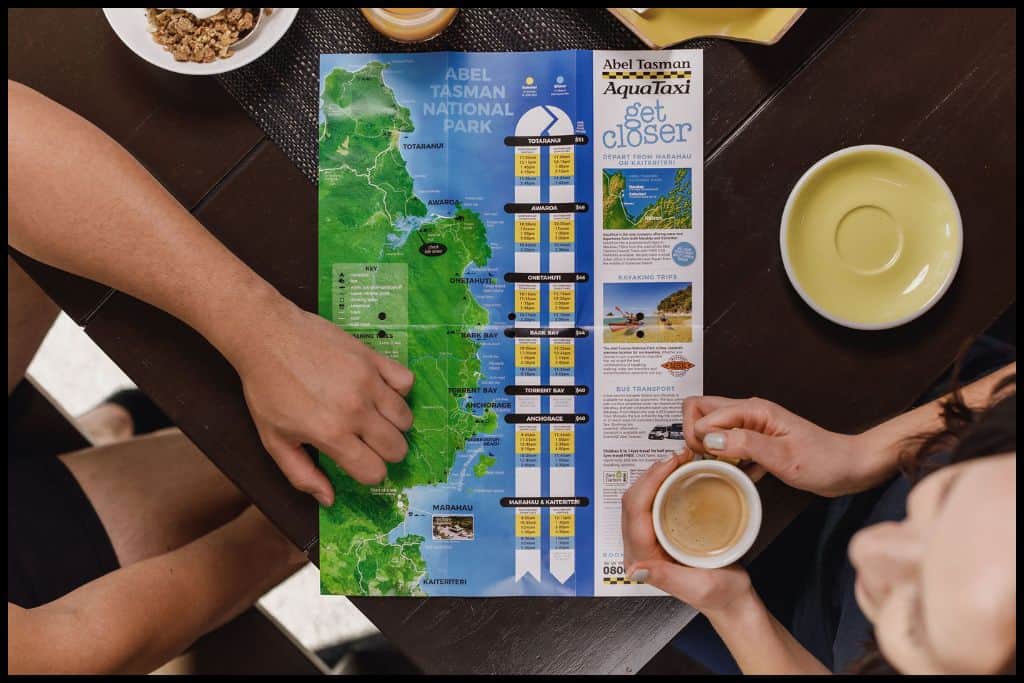 Aerial view of coffee table showing the Abel Tasman Aqua Taxi route map