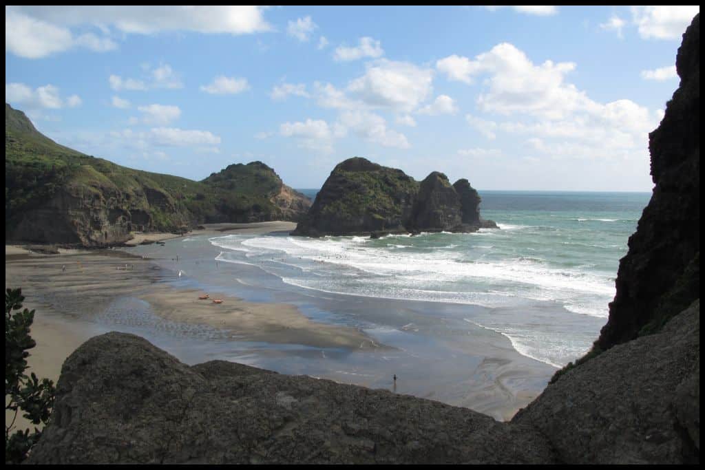 Photo shows a high angle South Piha Beach, as seen from Lion Rock.