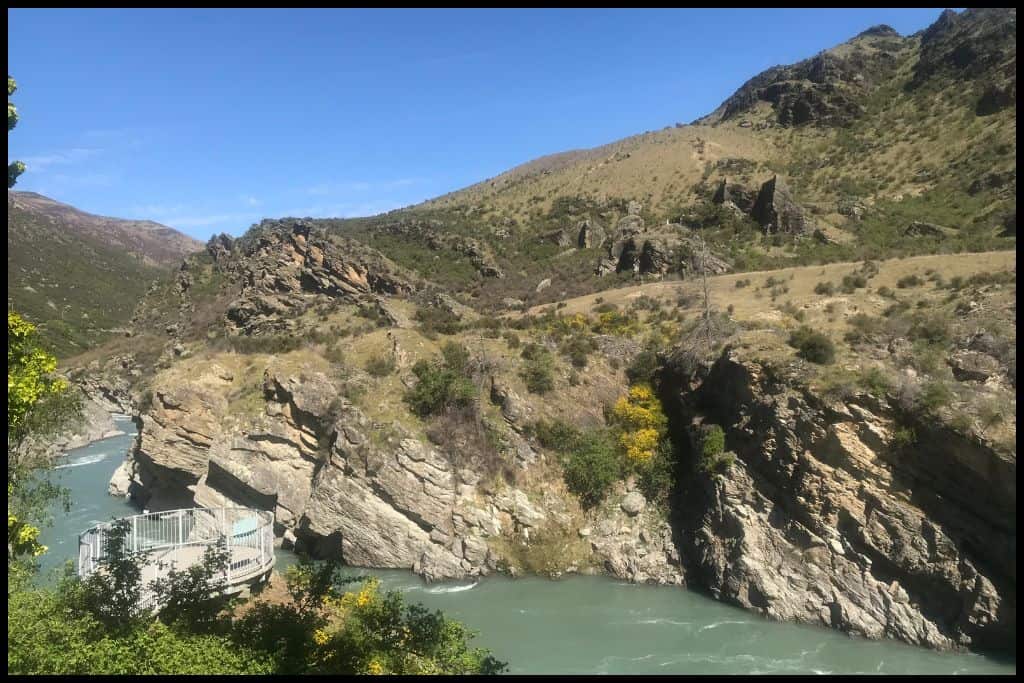 Photo taken from a stopping point near Roaring Meg captures the river and the rocky cliffs.
