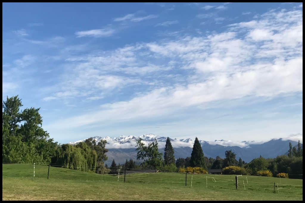 Snow caps the mountains surrounding Lake Wanaka.