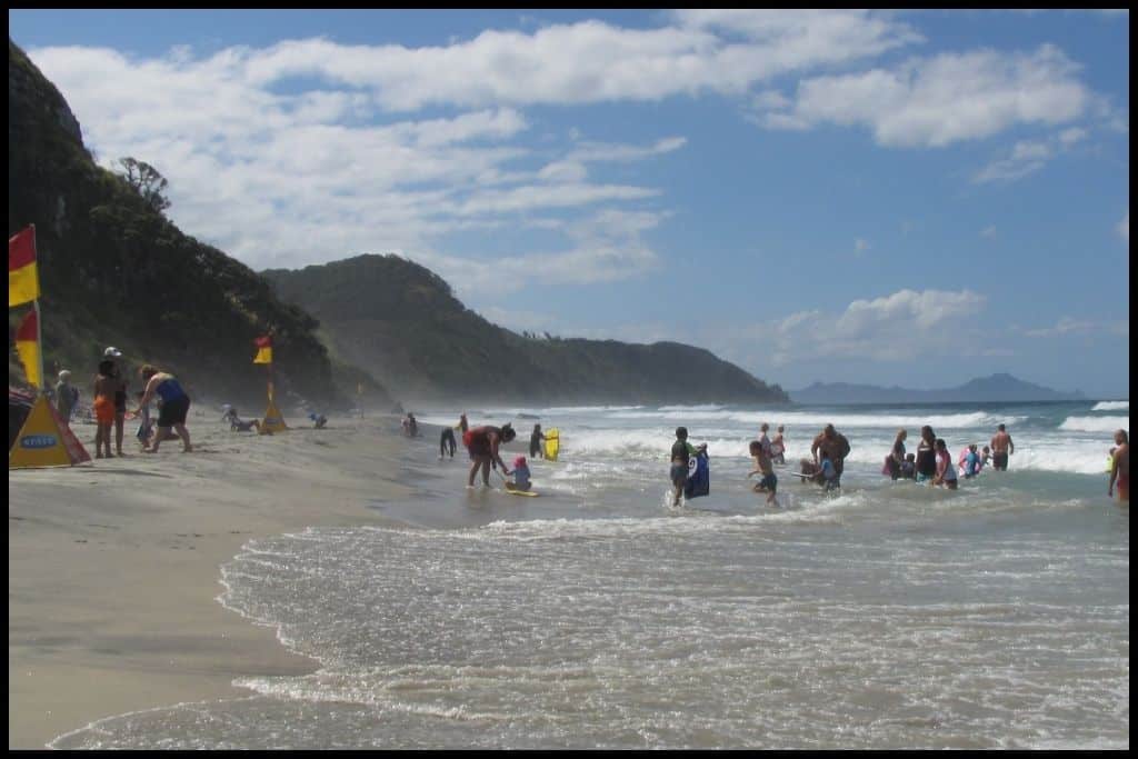 Surf patrol at busy Mangawhai Heads Beach.