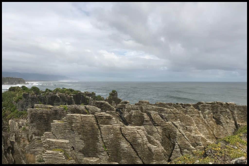 Punakaiki Pancake Rocks, pictured side on with all their layering obvious.