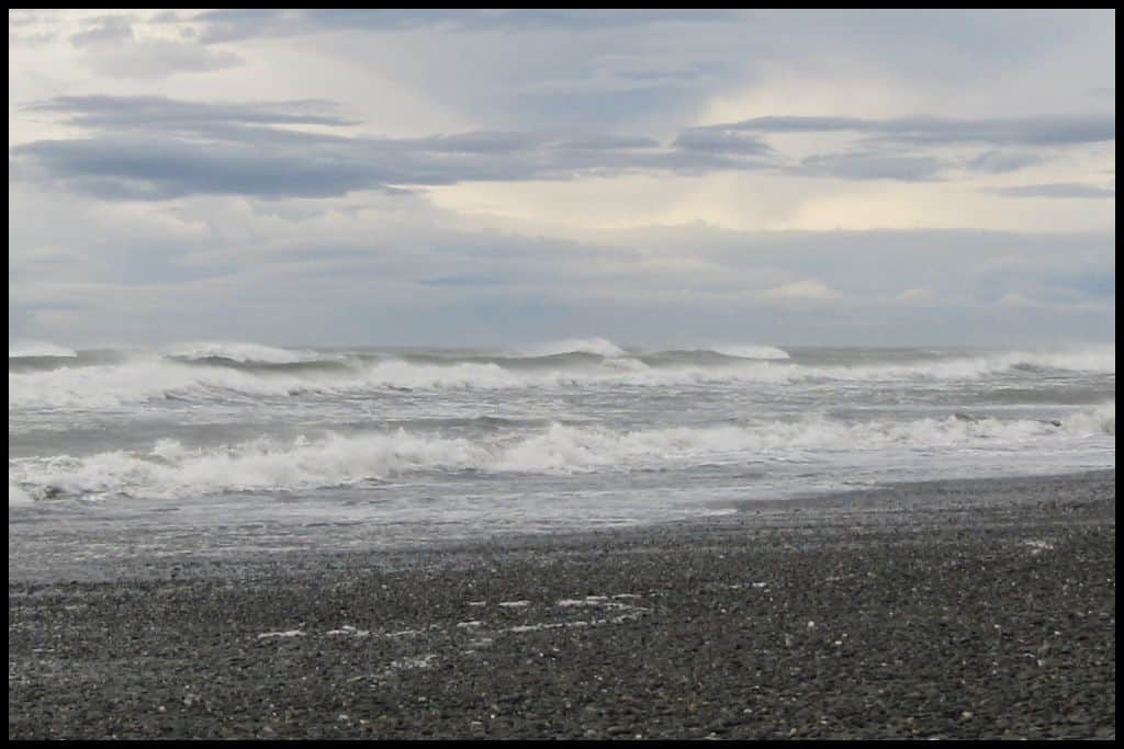 Pounding surf and stony foreshore: features of the Greymouth coastline.